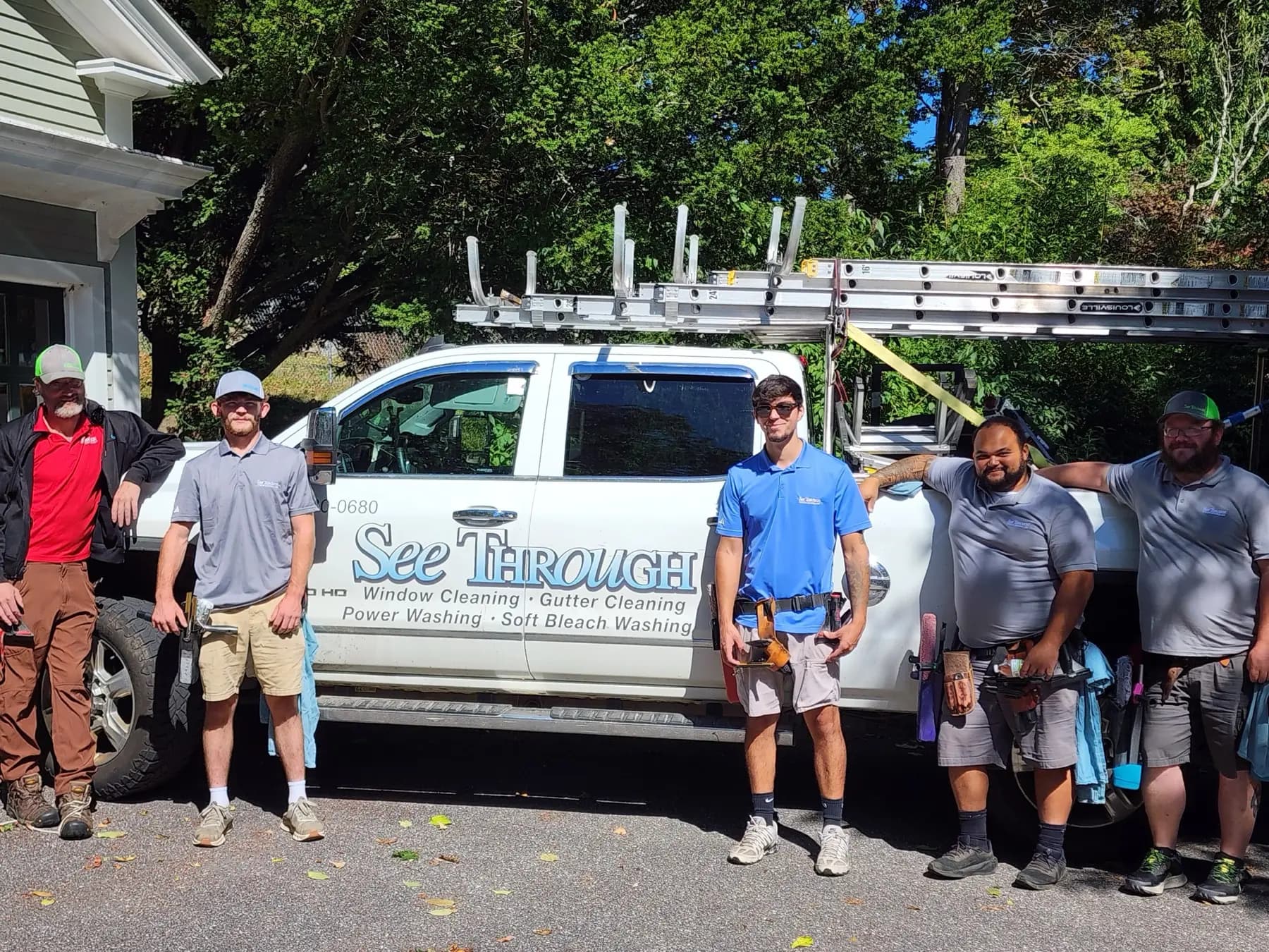 The See Through Window Cleaning crew with the truck