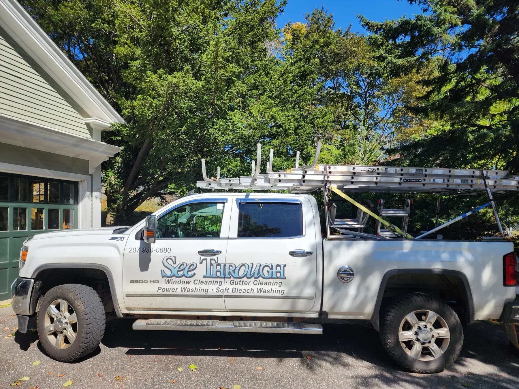 See Through Window Cleaning truck on a residential job