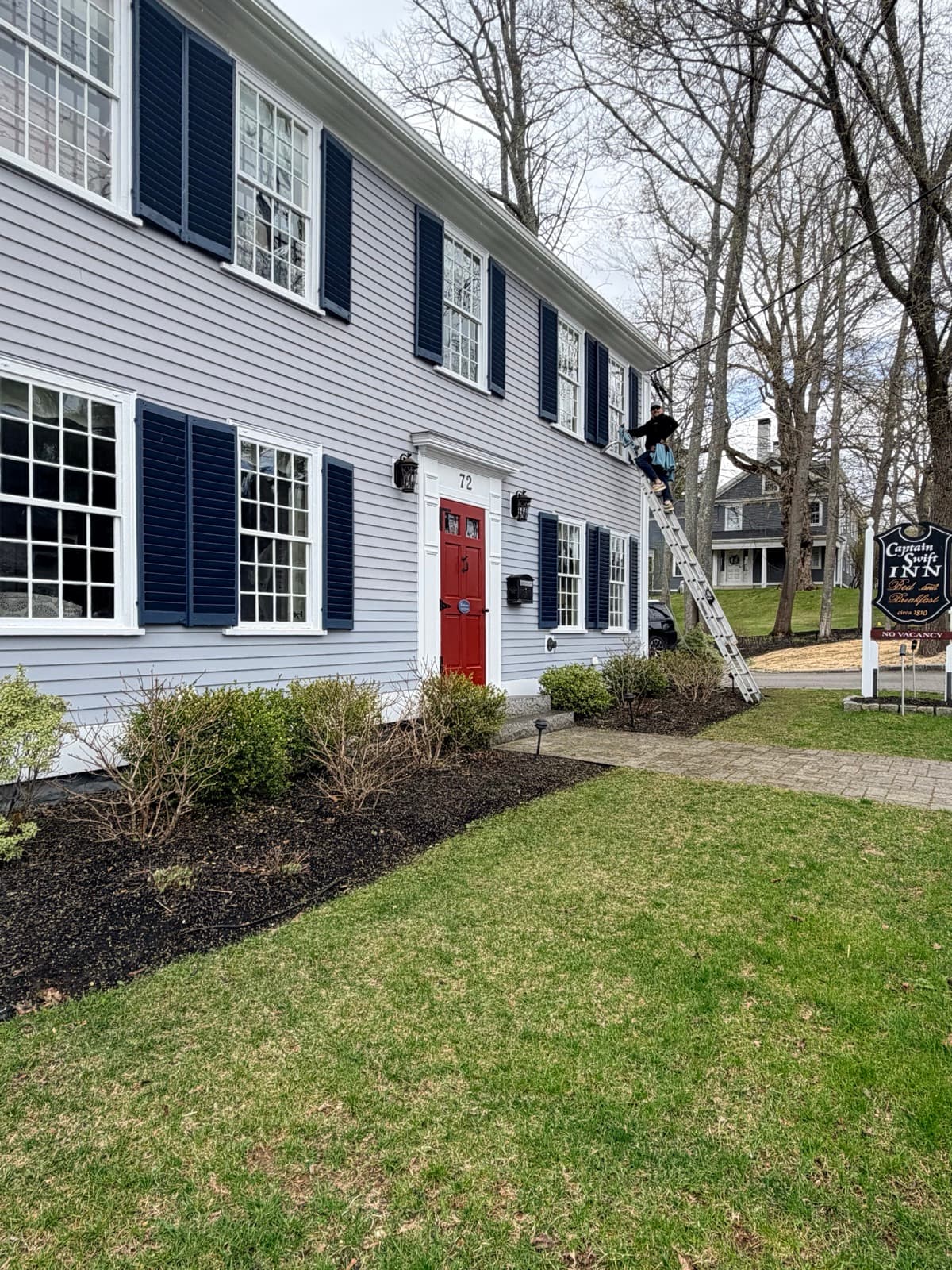 See Through Window Cleaning at work on a historic Maine inn